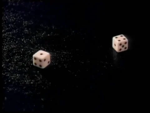 Close-up of person throwing dice on table Stock Footage 260255202