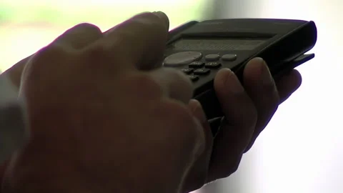 Close Up Of Person Typing On Calculator Doing Accounting Or Math Work - 4K Stock Footage 342742483