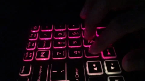 Close Up Person Typing Number On Wave Light Keyboard Stock Footage 215144884