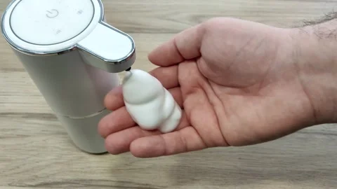 Close up on a person using automatic soap dispenser Video stock 270228688