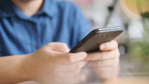 A close up of a person using a cell phone 库存影片 156844847