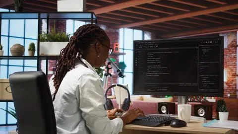 Close up of person using coding application to write and test code Stock Photos