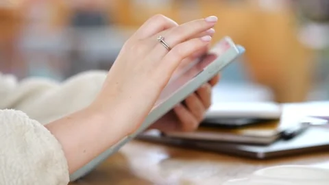 Close-up of person using digital tablet at table Stock Footage 345698123