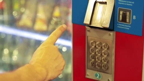 Close up of person using the keypad of a vending machine to make a purchase.. Stock-Footage 334102049