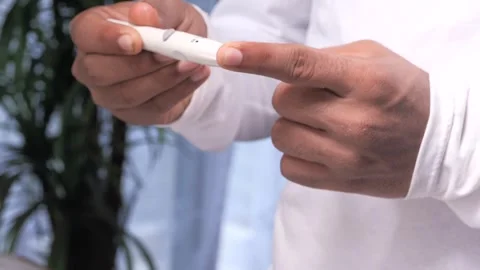 Close up of person using lancing device for finger prick test during day time Stock Footage 332626232