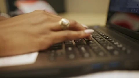 A close up of a person using a laptop computer Stock Footage 155533114