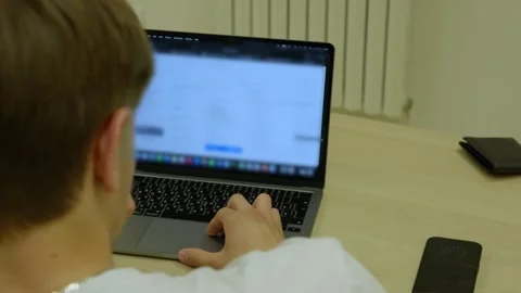 Close Up of Person Using Laptop in Modern Office Stock Footage 341765451