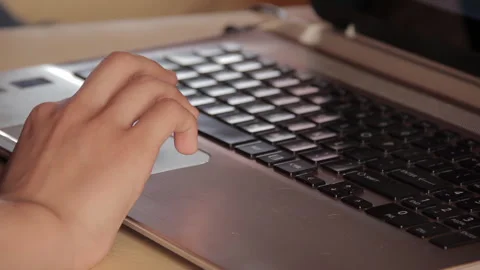 Close Up Of Person Using Laptop Touchpad And Typing On Keyboard - 4K Stock Footage 342743052