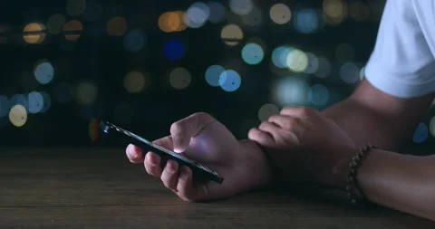 Close-up of person using mobile phone, browsing social network. Male hand Stock Footage 237141412