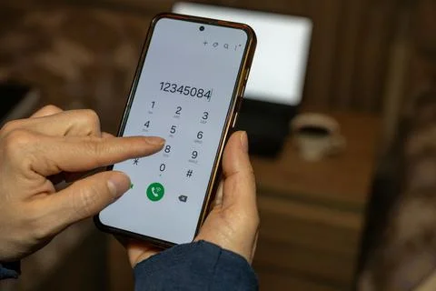 Close up of person using smartphone touchscreen. Stock Photos