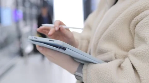 Close-up of person using tablet and stylus Stock Footage 347930749