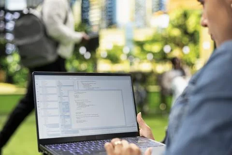 Close up of person working with programming interface and source code Stock Photos