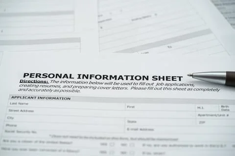 Close up of personal information sheet with pen on application form Stockfoto's