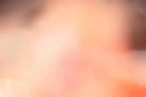 Close-up of a person's blurred face with soft light Stock Photos