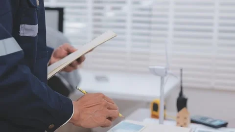 Close-up Of Person's engineer Hand Drawing Plan On Blue Print with architec.. Stock Footage 345608031