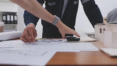 Close-up Of Person's engineer Hand Drawing Plan On Blue Print with architec.. Stock Footage 345608086