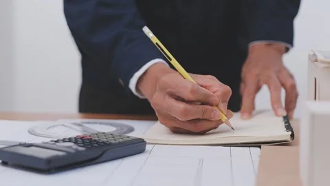 Close-up Of Person's engineer Hand Drawing Plan On Blue Print with architec.. Stock Footage 345608096