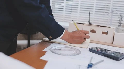 Close-up Of Person's engineer Hand Drawing Plan On Blue Print with architec.. Stock Footage 345608104