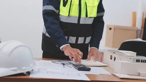Close-up Of Person's engineer Hand Drawing Plan On Blue Print with architec.. Stock Footage 345608212