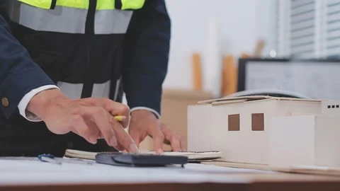 Close-up Of Person's engineer Hand Drawing Plan On Blue Print with architec.. Stock Footage 345608213