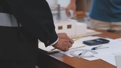 Close-up Of Person's engineer Hand Drawing Plan On Blue Print with architec.. Stock Footage 345608259
