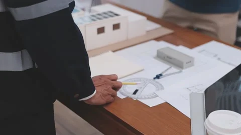 Close-up Of Person's engineer Hand Drawing Plan On Blue Print with architec.. Stock Footage 345608264