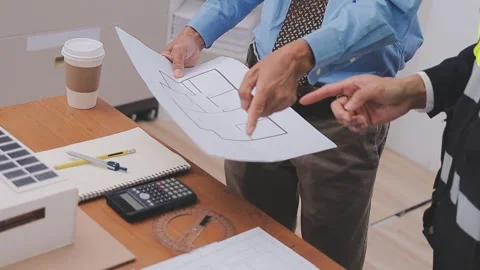 Close-up Of Person's engineer Hand Drawing Plan On Blue Print with architec.. Stock Footage 345609016