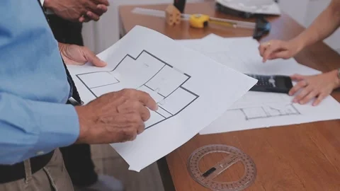 Close-up Of Person's engineer Hand Drawing Plan On Blue Print with architec.. Stock Footage 345609065