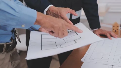 Close-up Of Person's engineer Hand Drawing Plan On Blue Print with architec.. Stock Footage 345609067