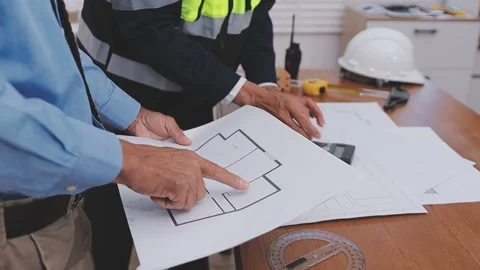 Close-up Of Person's engineer Hand Drawing Plan On Blue Print with architec.. Stock Footage 345609084