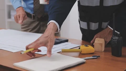 Close-up Of Person's engineer Hand Drawing Plan On Blue Print with architec.. Stock Footage 345609110