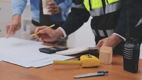 Close-up Of Person's engineer Hand Drawing Plan On Blue Print with architec.. Stock Footage 345609125