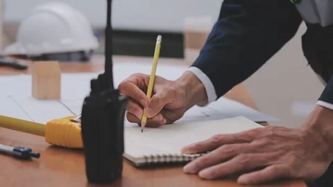 Close-up Of Person's engineer Hand Drawing Plan On Blue Print with architec.. Stock Footage 345609230