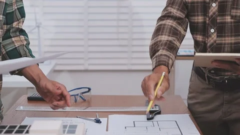 Close-up Of Person's engineer Hand Drawing Plan On Blue Print with architec.. Stock Footage 345610695