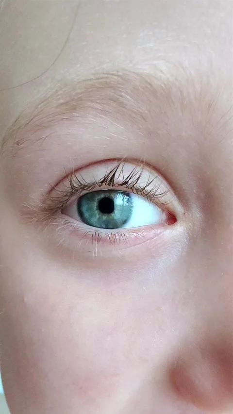 Close-up of Person's Eye With Blue Iris. Blue Eye of Child. Video stock 281639768