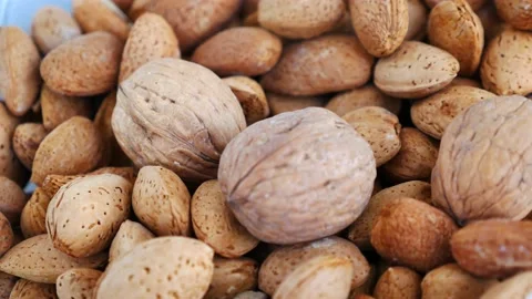 Close-up of a person's hand dry shelled almonds,shelled almonds, 動画素材 167137046