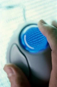 Close up of a persons hand holding a computer mouse Stock Photos