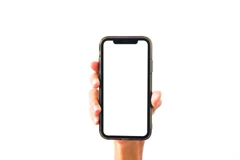 Close-up of a person's hand holding an empty smartphone screen mockup in br.. 스톡 사진