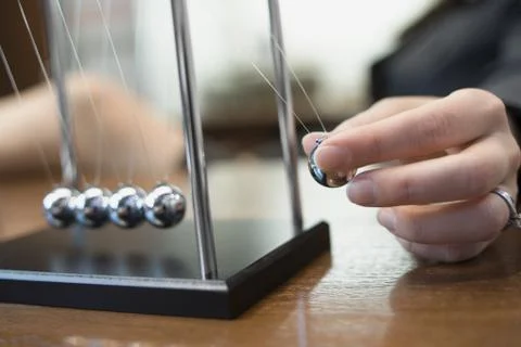 Close-up of a person's hand holding a pendulum Stock Photos
