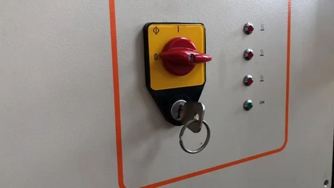 Close-up of persons hand switching machine button in factory Stock Footage 120420189