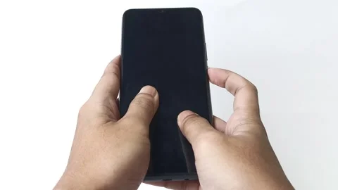 Close-up of a person's hands interacting with the touchscreen on a cellphone Stock Footage 313381329