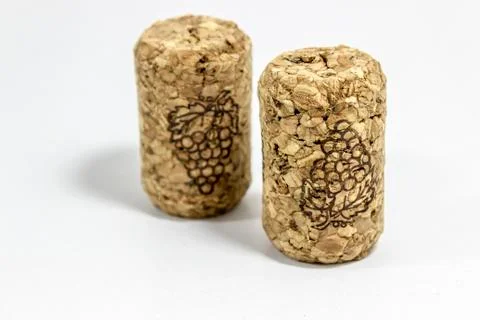 Close-up perspective shot of wine corks with blurry white background Stock Photos
