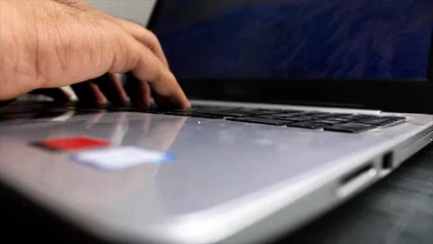 Close-up Perspective shot of a women typing in laptop. Stock Footage 254615598