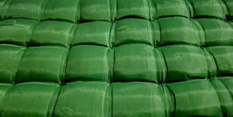 Close-up Perspective of Tufted Green Inflatable Mattress Stock Photos