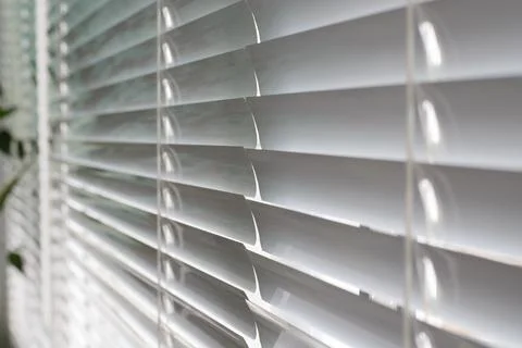Close Up Perspective View of Modern White Venetian Window Blinds Slats Stock Photos