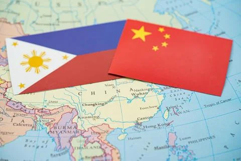 Close up of Philippines and China flags on map of Asia Stock Photos
