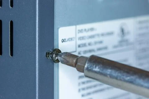 Close up of Phillips screw and hex head screwdriver Stock Photos