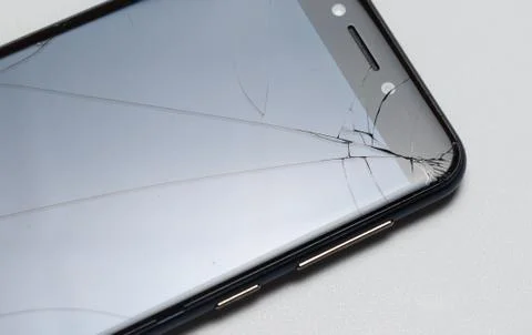 Close-up of phone or tablet with broken screen Stock Photos