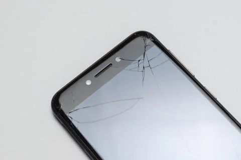 Close-up of phone or tablet with broken screen Stock Photos