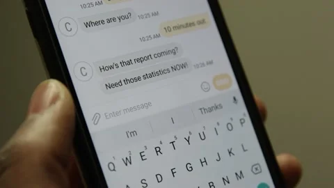 Close up of phone screen with text messages asking for a report and statistics Video stock 131339186